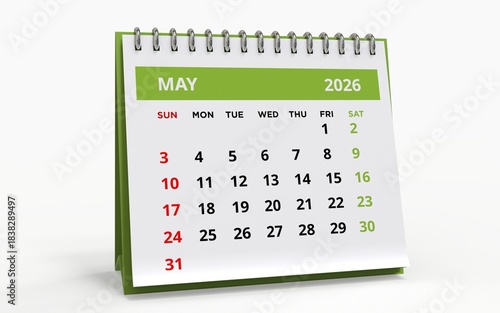 Obraz na płótnie Standing  Desktop calendar for May 2026, standard format with a green header and metal spiral binding, the week starting on Sunday