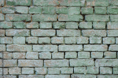 Old green brick wall texture. Abstract background and texture for design.