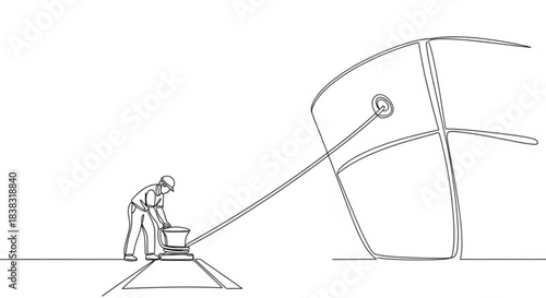 Worker securing ship to dock with mooring lines and equipment  
