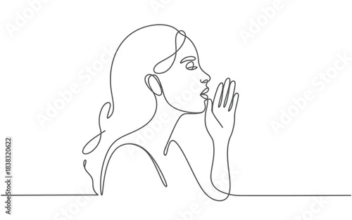 Woman whispering with hand near mouth