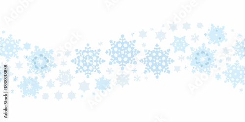 A light blue and white repeating pattern of delicate winter snowflakes