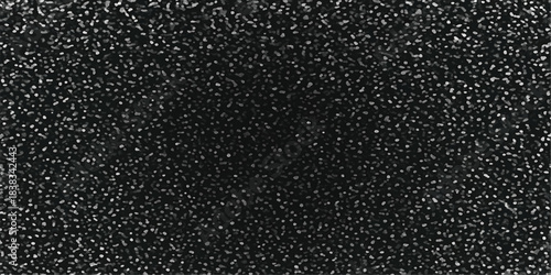 Rough black asphalt stone texture with a dark grey bitumen surface pattern creates an abstract street road material wallpaper backdrop