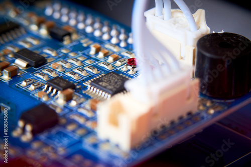 Close-up of electronic circuit board with electronic components. Technology background