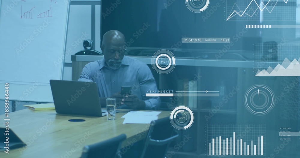 Fototapeta premium Checking man in light-blue shirt scrolling phone and reviewing laptop in meeting room with papers