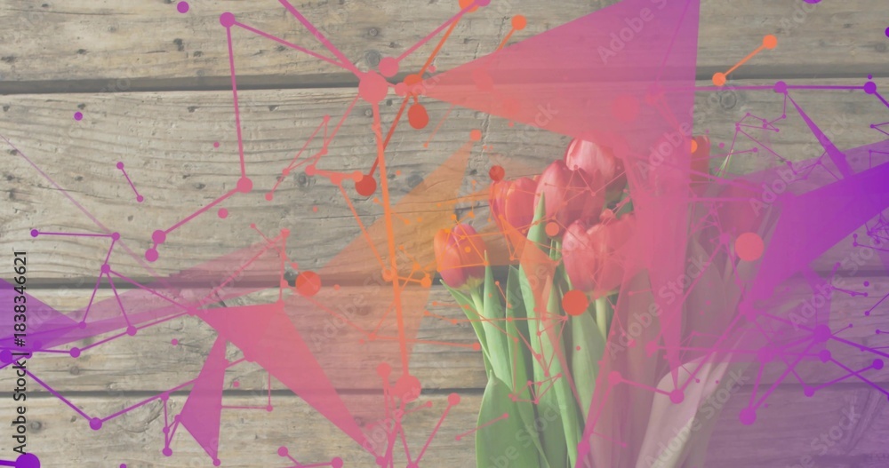 Fototapeta premium Showing pink tulip bouquet, green stems in pale wrap on wooden plank, colorful overlays, copy space