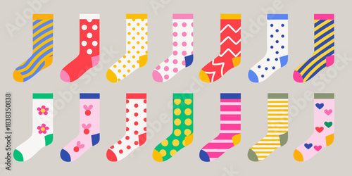 A colorful collection of patterned socks displayed on a neutral gray background