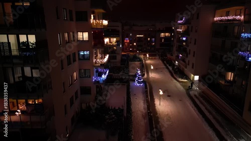 Wallpaper Mural Aerial view of multifamily houses in a residential estate during the Christmas season, with a drone camera slowly rising upward. Torontodigital.ca