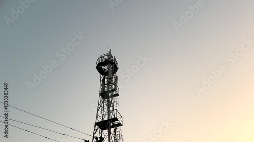 Man climb on mobile tower
