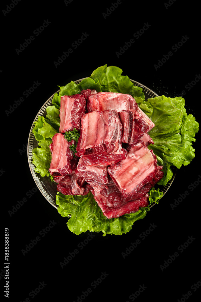 Obraz premium Fresh Raw Beef Inner Cut Steaks on Lettuce - Premium Quality Meat