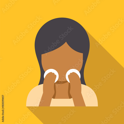 Woman using cotton pads on her face as part of her daily skincare routine