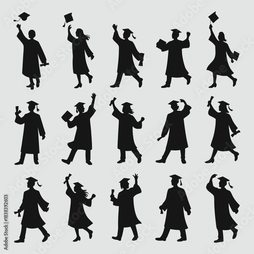 Silhouettes of graduates in caps and gowns celebrating