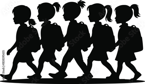 Silhouette of children walking in line to school