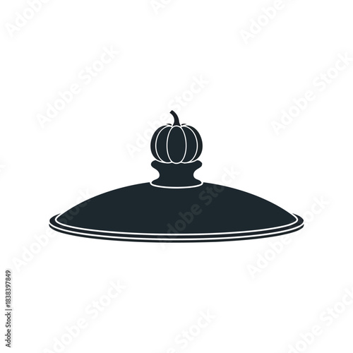 Dark Silhouette of a Pumpkin on a Serving Dish Lid