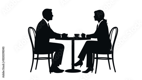 Silhouette Cafe Conversation: A captivating silhouette captures two figures engaged in a private conversation at a cafe.