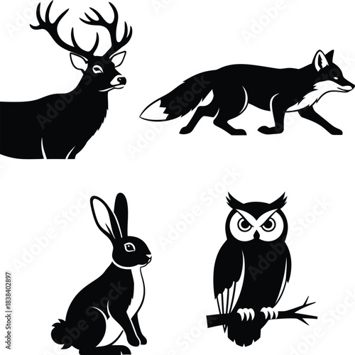 Black silhouette set of four forest animals including deer fox rabbit and owl.