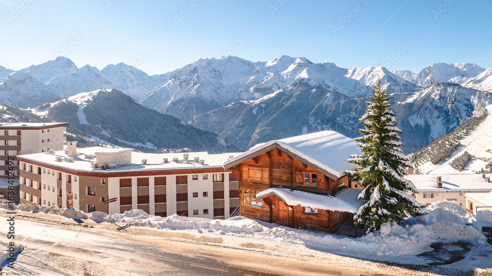 Fototapeta premium View of the snow-covered mountains in winter from Alpe d'Huez