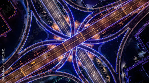 Cuadro en lienzo Aerial Night View of Illuminated Highway Interchange with Converging Roads and L