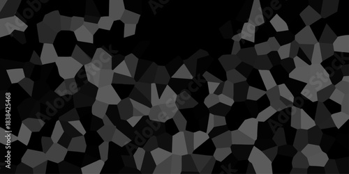 Abstract geometric mosaic pattern with varying shades of gray and black creating a textured, modern background for design projects