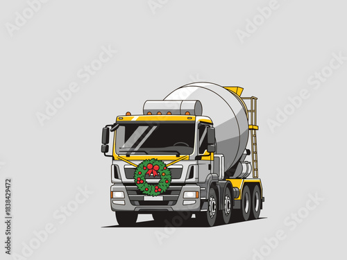 Cement truck decorated with a Christmas wreath on gray background  
