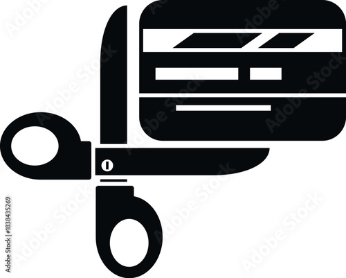Scissors cutting a credit card illustrating debt reduction and financial freedom