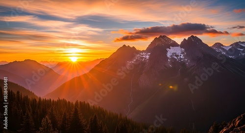 Mountain sunset landscape dramatic sky orange glow alpine peaks forest silhouette wilderness nature vista scenic beauty