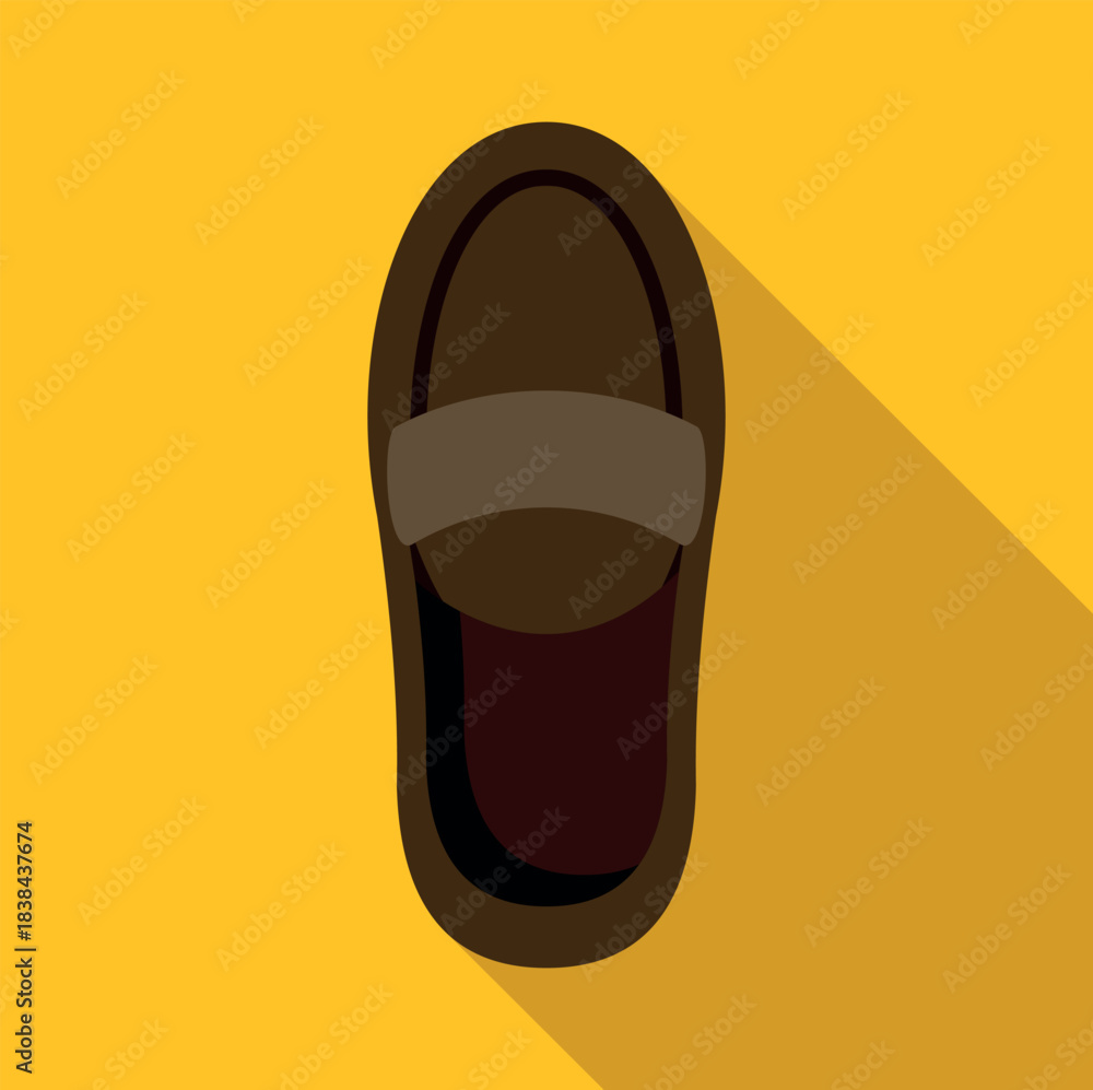 Obraz premium Brown loafer shoe with shadow on a yellow uniform background
