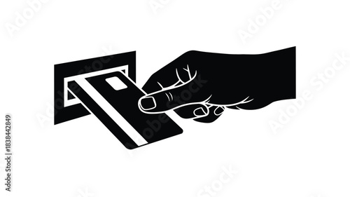 A hand inserting a credit card into a card reader slot