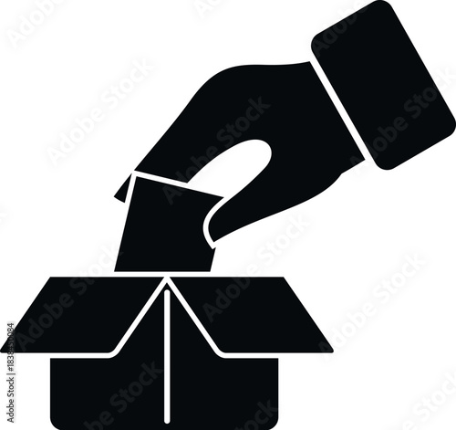 Hand dropping ballot into an election box for voting