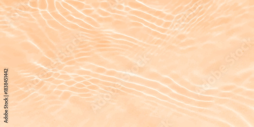 Natural sand dune texture background with abstract wind-blown ripples and waves on a dry, summer beach
