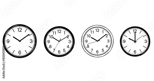 Collection of four different black and white analog clocks