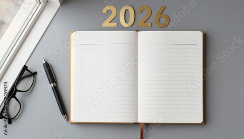 Open Notebook with Cutouts and Writing Essentials