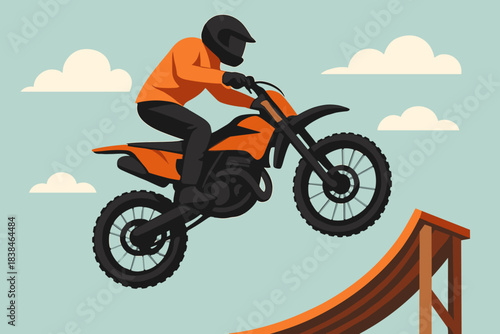 Motorbike rider jumps off a ramp during a stunt performance in an outdoor setting with blue sky and clouds