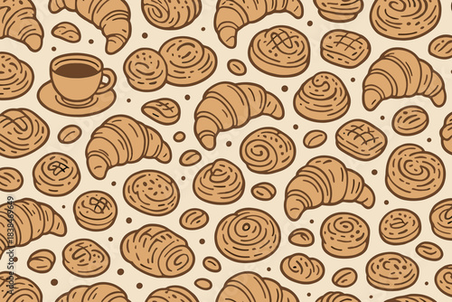 Croissants and coffee beans display on a light surface in a busy cafe setting during the morning hours