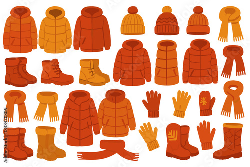 Collection of warm clothing items for autumn and winter activities in bright orange shades laid out on a white background
