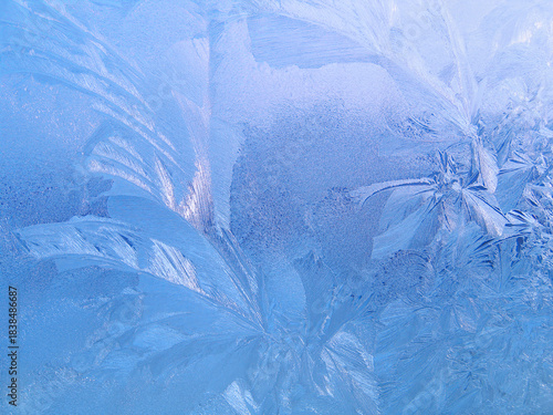 Beautiful ice pattern on window gass, natural winter texture