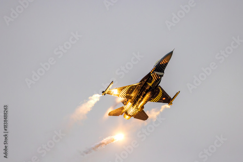 Slika na platnu Turkish Stars F-16 fighter jet releasing flares during an aerial display