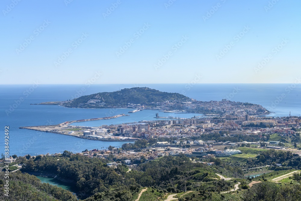 Obraz premium Aerial view of the city of Ceuta surrounded by the Mediterranean Sea.