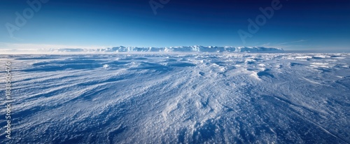 Majestic antarctic ice landscape under clear blue sky