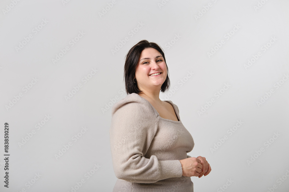 Obraz premium headshot of Adult woman smiling, posing in studio shot