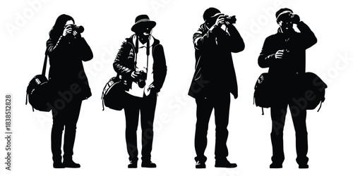 Silhouettes of photographers with cameras and bags