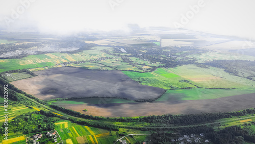 wide panorama angle view aerial drone photography country side agricultural field land meadow misty morning dew smoke condition light