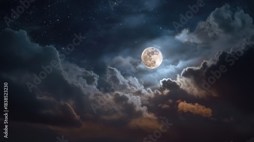 The bright moon lights up the night sky as it shines through thick clouds. Stars are visible in the dark space above creating a clear night view.