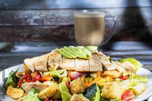 Special house salad with roast chicken.