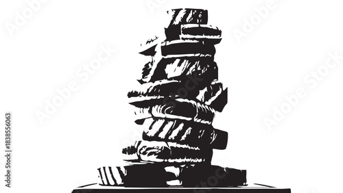 Balanced rock cairn stacked on rugged natural surface.