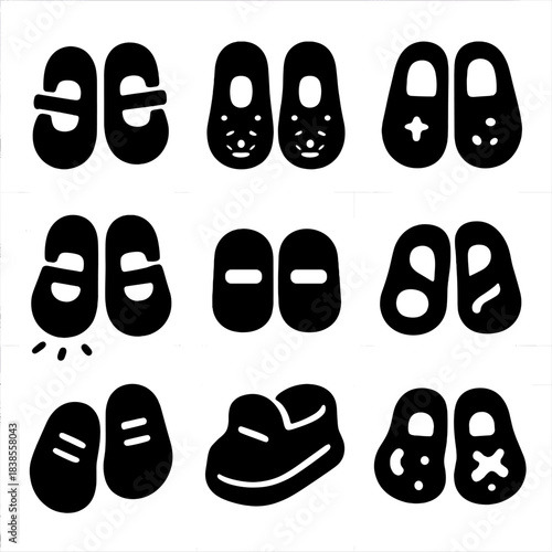 Collection of various black shoe silhouettes on gray grid background