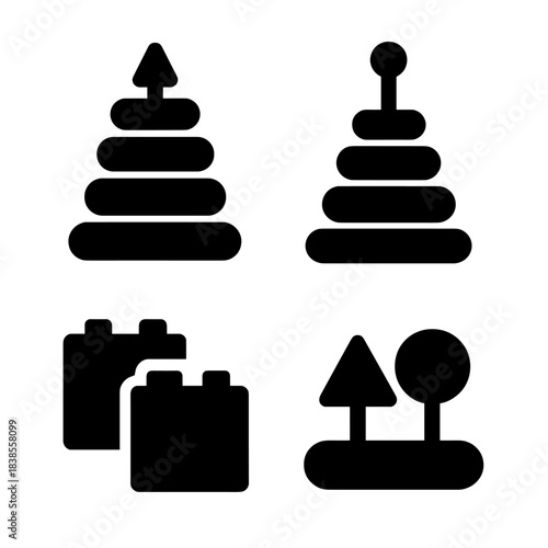 Silhouette of stacking toys: pyramid, blocks, and trees on black background