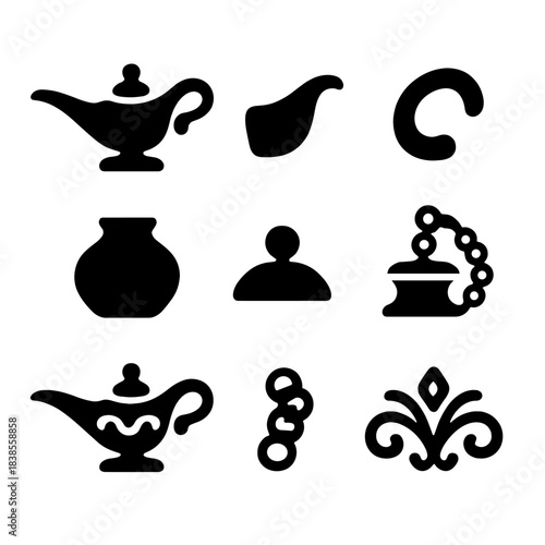 Vintage silhouette icons of aladdin lamp and ornate elements