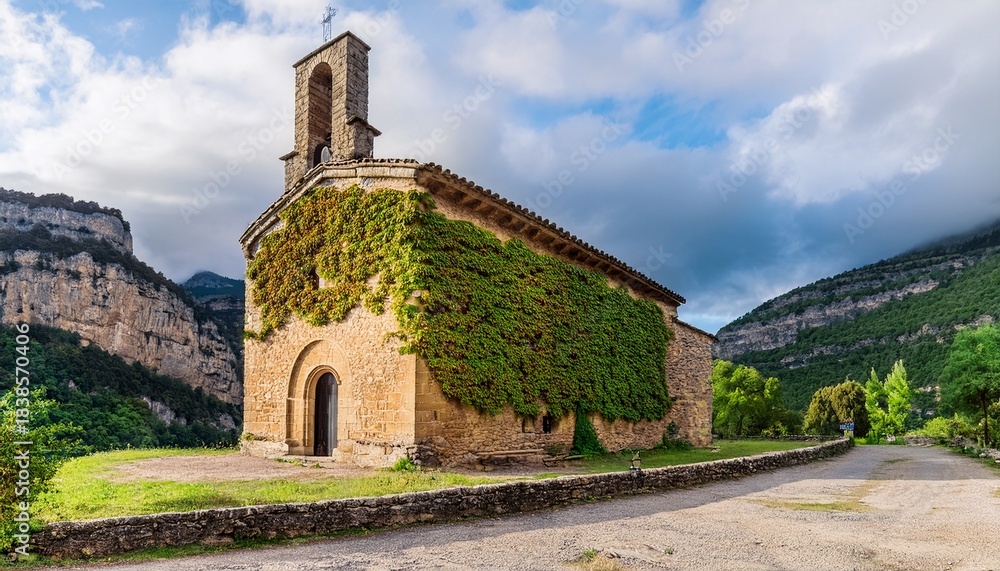 Fototapeta premium chapel of nuestra senora de los dolores in fanlo with rustic stone facade ivy covered walls and historic charm in ordesa aragon spain
