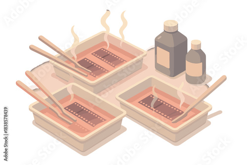 Darkroom Essentials Icons. Isometric vector illustration set Darkroom essentials: three developer trays with film strips soaking