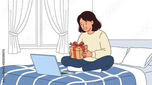 Joyful woman opening gift while sitting on bed with laptop in a cozy bedroom with curtains and a window with a nighttime view